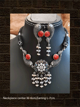 Load image into Gallery viewer, German silver stones studded fish design set with black thread dori - Odara Jewellery