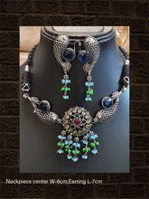 Load image into Gallery viewer, German silver stones studded fish design set with black thread dori - Odara Jewellery