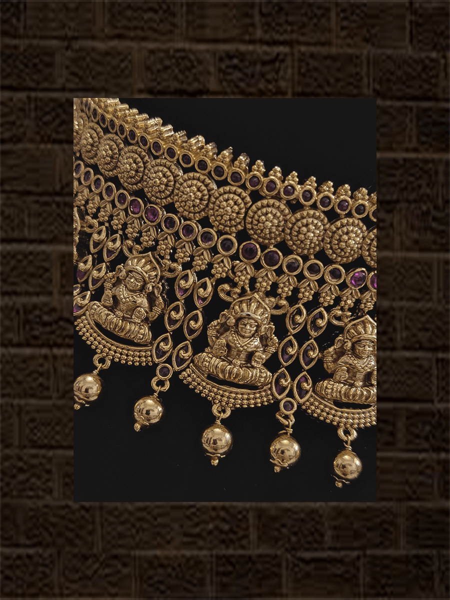 Laxmiji on wavy design choker set with ruby stones and gold bead drops - Odara Jewellery