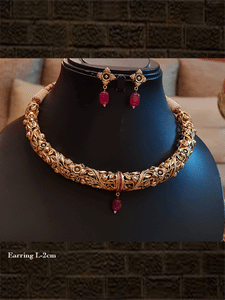 Antique gold finish intricate design hasli with ruby drop - Odara Jewellery