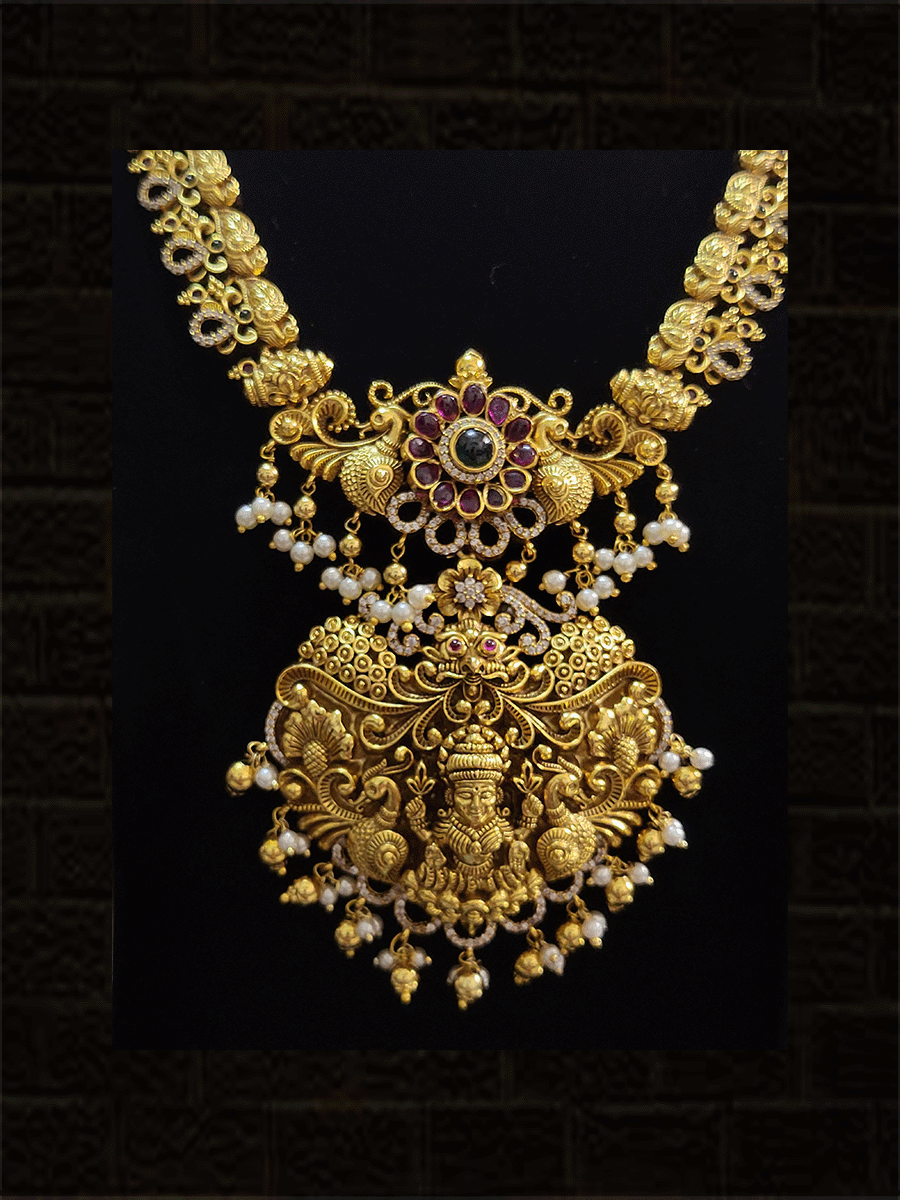 Peacock side string studded with zircons,ruby and green stones long laxmiji pendant set - Odara Jewellery