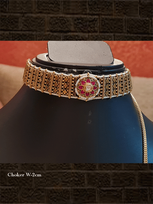 Gold finish pirohi work choker set with ruby and kundan circular tukdi in the centre(chain dori) - Odara Jewellery