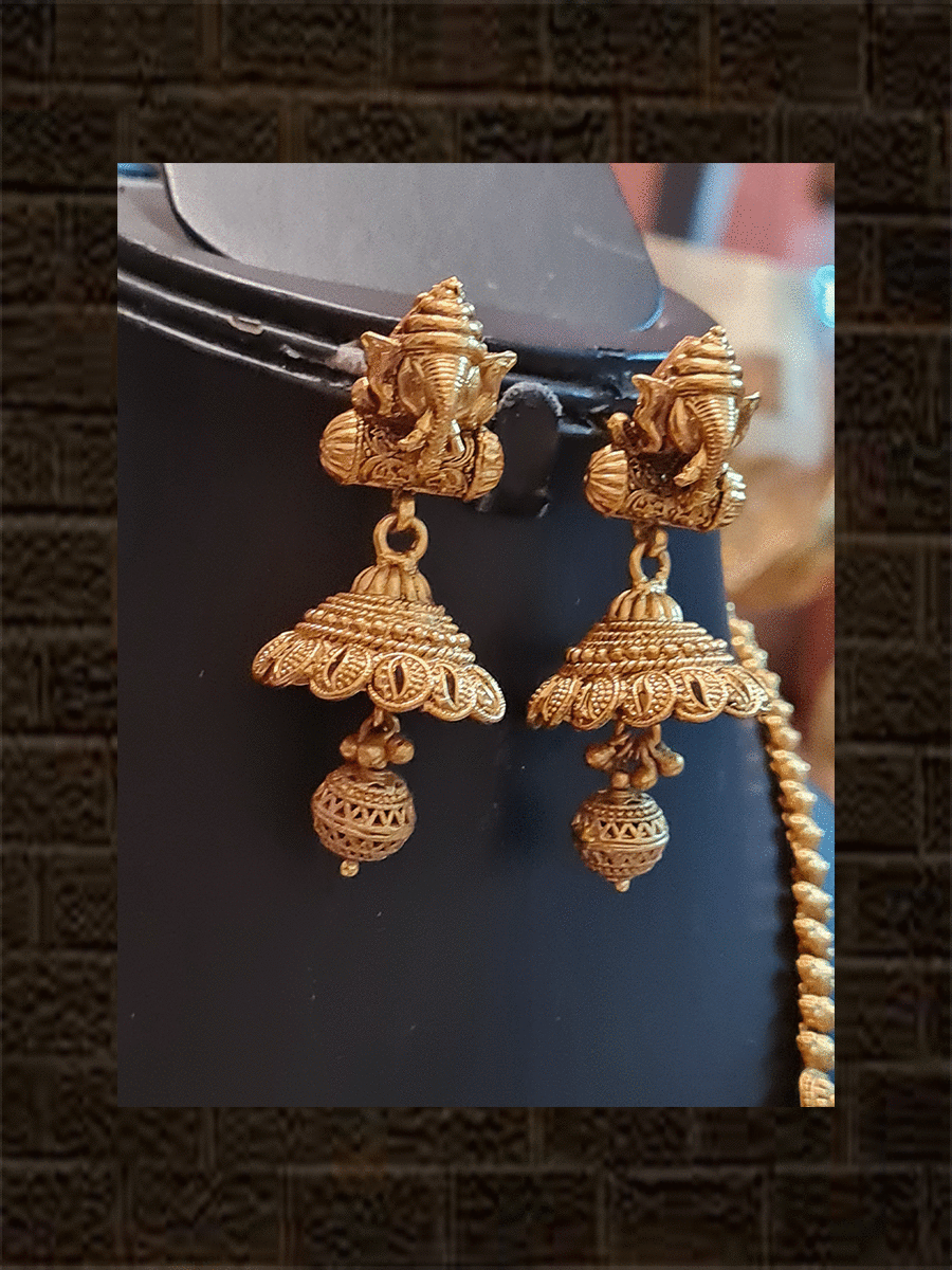 Flower design pendant set with ganpati ji on inverted peacock design long set - Odara Jewellery