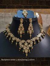 Load image into Gallery viewer, Gold finish antique look kundan set with green bead detailing(Maangtika included) - Odara Jewellery
