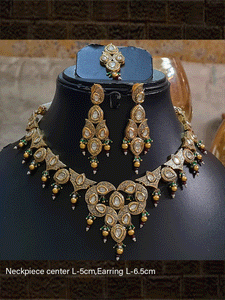 Gold finish antique look kundan set with green bead detailing(Maangtika included) - Odara Jewellery