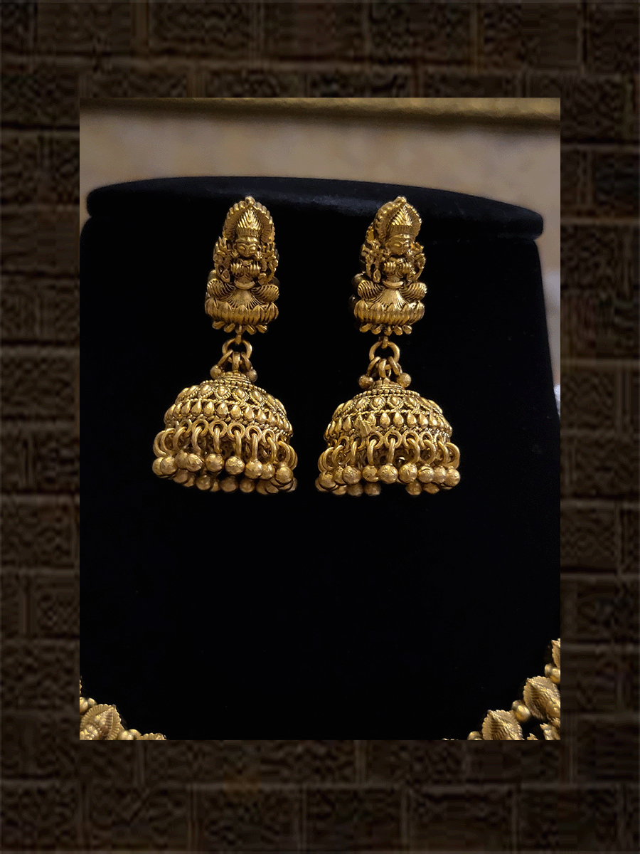 Laxmiji side string with ruby and green stones studded bold laxmiji pendant set - Odara Jewellery