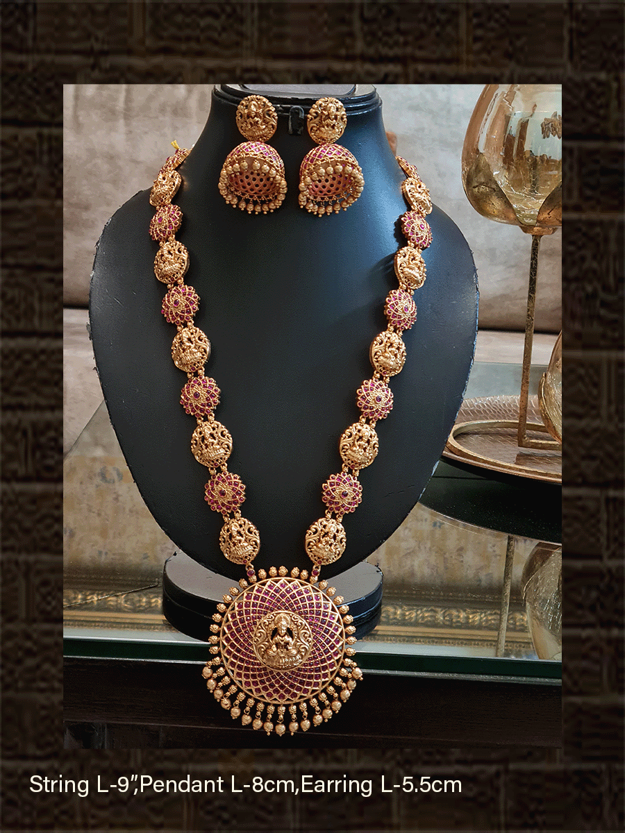 Round ruby stone studded laxmiji motif pendant long set with flower and laxmiji design side chain - Odara Jewellery