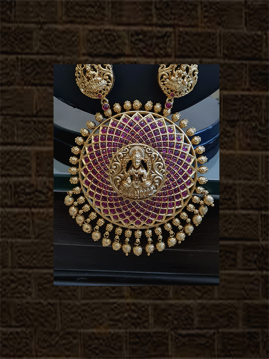Round ruby stone studded laxmiji motif pendant long set with flower and laxmiji design side chain - Odara Jewellery
