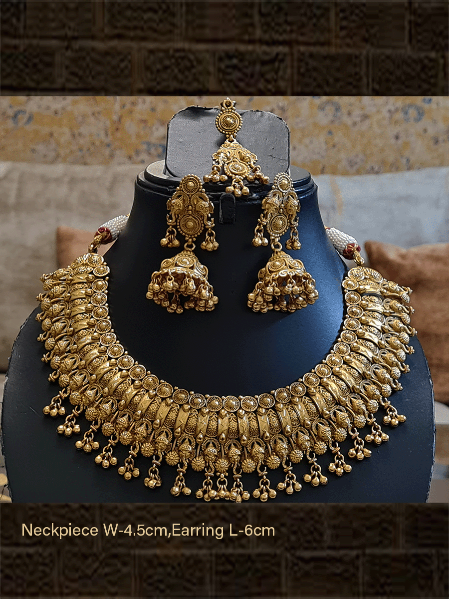Self design gold finish ganpatiji motif broad set with maangtika and jhoomkies - Odara Jewellery