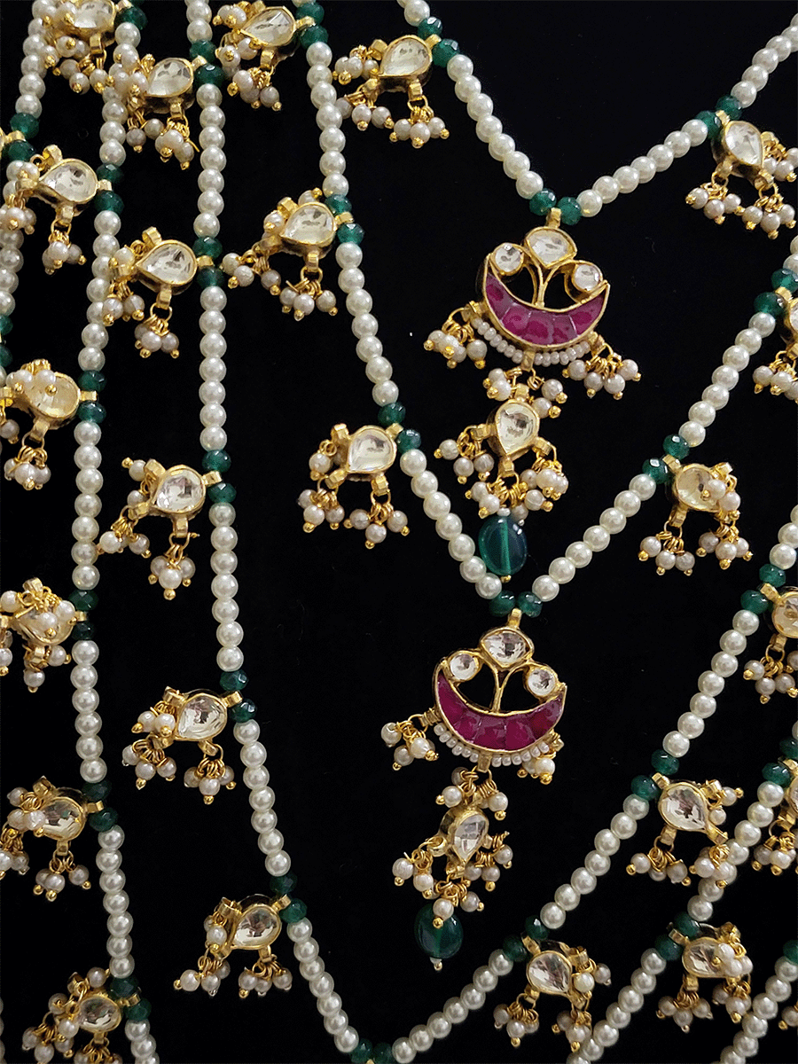 Five layer pacchi kundan set with ruby and green tukdies in pearl strings(15 inch long) - Odara Jewellery
