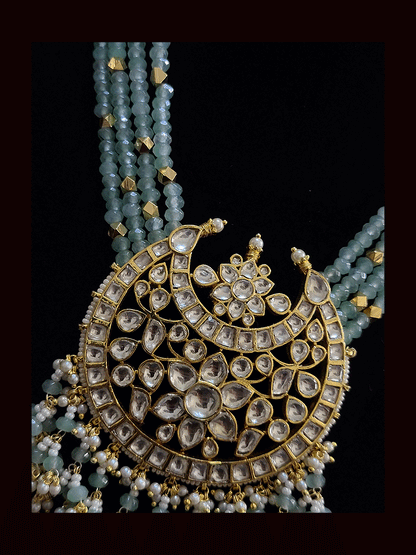Bold paachi kundan pendant in four beaded strings neckpiece