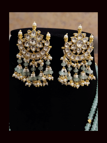 Bold paachi kundan pendant in four beaded strings neckpiece