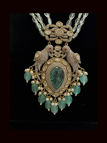 Three coloured glass bead strings long antique finish pendant set with tear drop stone in pendant with AD and kundan