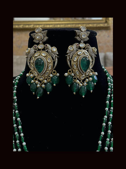 Three coloured glass bead strings long antique finish pendant set with tear drop stone in pendant with AD and kundan