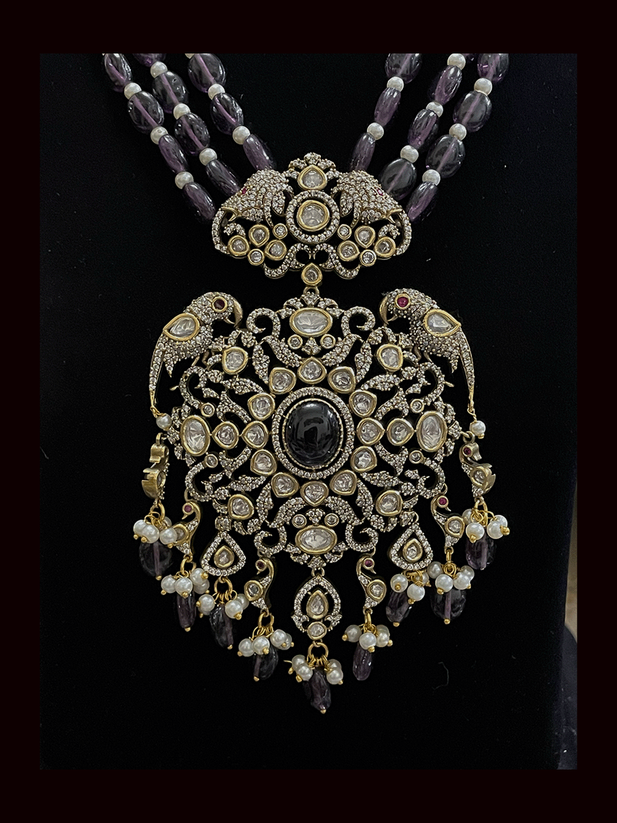 Three beaded 9 inch long strings zircons and kundan studded pendant set with parrot motifs on sides