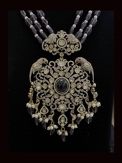 Three beaded 9 inch long strings zircons and kundan studded pendant set with parrot motifs on sides