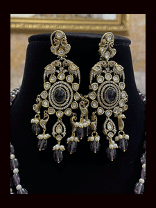 Three beaded 9 inch long strings zircons and kundan studded pendant set with parrot motifs on sides