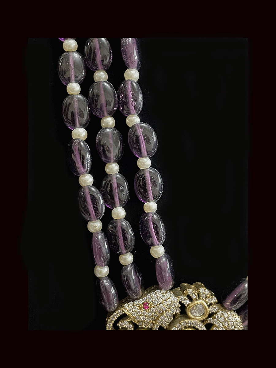 Three beaded 9 inch long strings zircons and kundan studded pendant set with parrot motifs on sides
