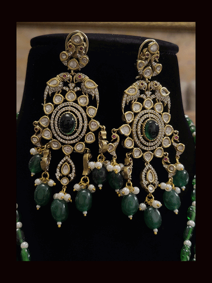 Three beaded 9 inch long strings zircons and kundan studded pendant set with parrot motifs on sides