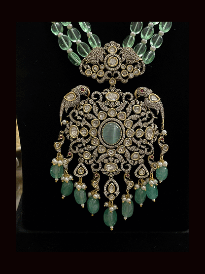 Three beaded 9 inch long strings zircons and kundan studded pendant set with parrot motifs on sides