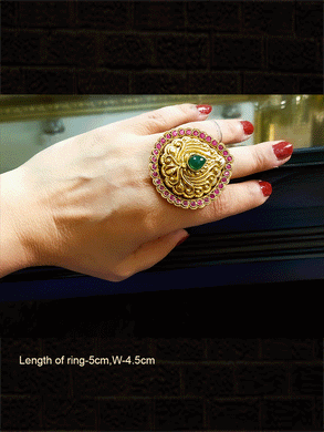 Bold leaf shaped ruby and green stones ring