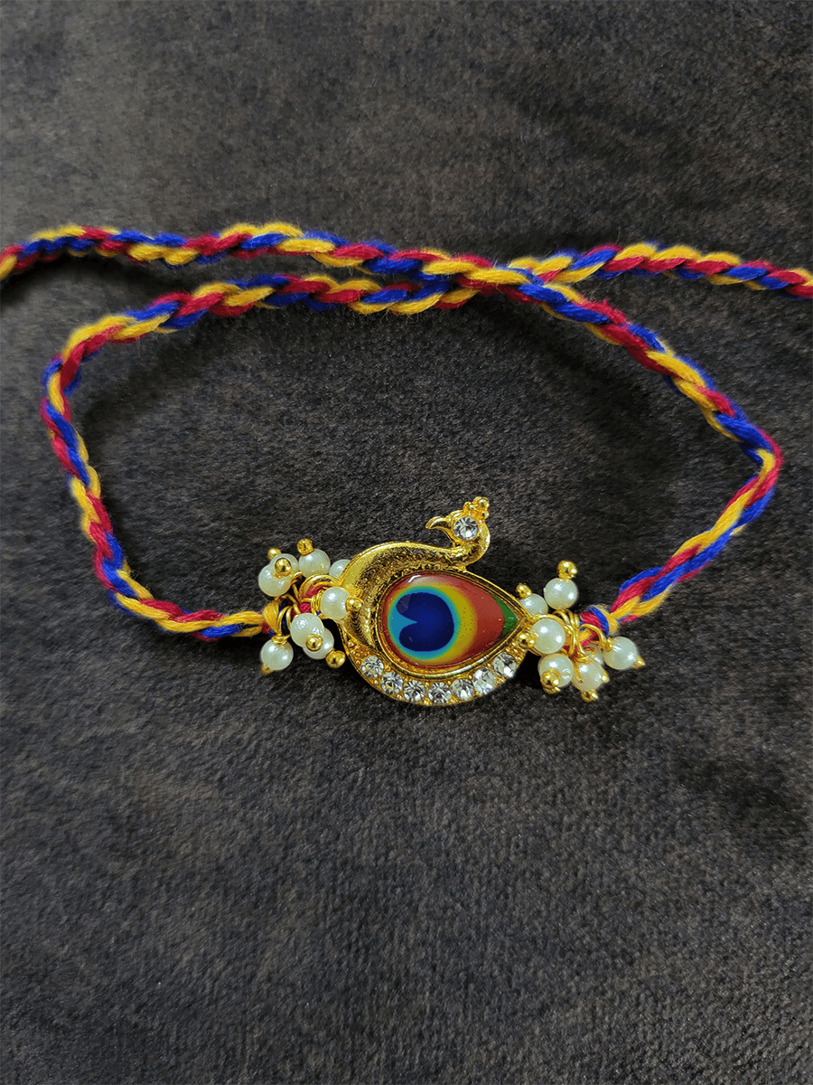Peacock design rakhi - Odara Jewellery