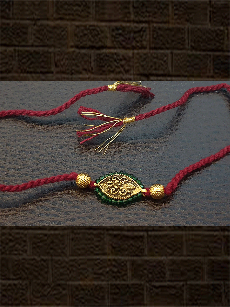 Antique tukdi with green pirohi maroon thread rakhi - Odara Jewellery