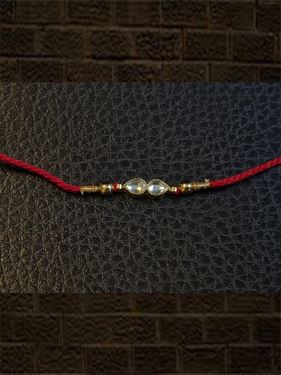 Two leaf Kundan rakhi with gold bead on sides rakhi - Odara Jewellery
