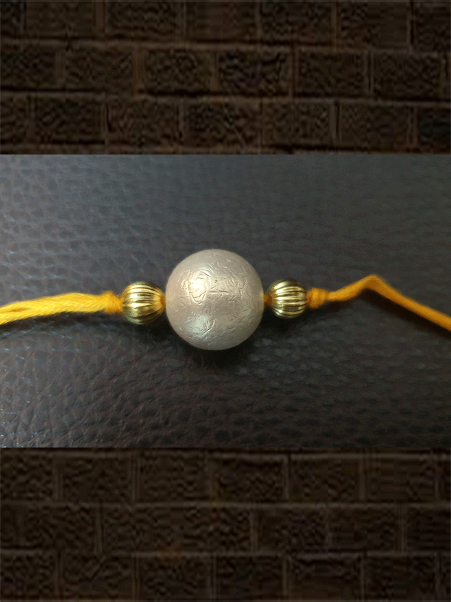 Yellow thread pearl bead rakhi - Odara Jewellery