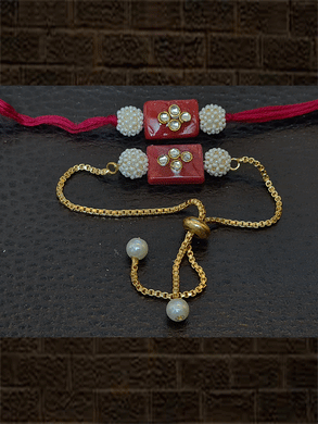 Rectangular red stone kundan bhai bhabhi rakhi with pearl beads - Odara Jewellery