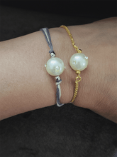 Load image into Gallery viewer, White bead studded with crystal bhai bhabhi rakhi - Odara Jewellery