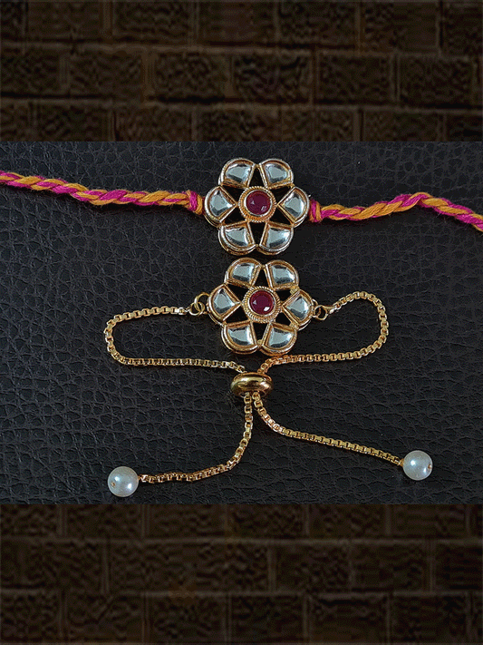 Kundan flower with centre ruby stone bhai bhabhi rakhi in yellow and pink thread - Odara Jewellery