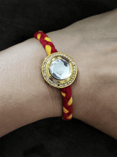 Load image into Gallery viewer, Round bold polki with AD line rakhi in mouli - Odara Jewellery