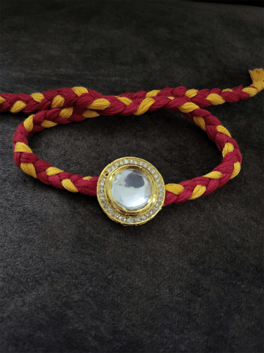 Round bold polki with AD line rakhi in mouli - Odara Jewellery