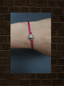 Sterling silver self design round bead rakhi in magenta thread - Odara Jewellery