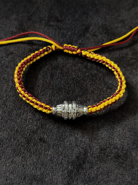 Sterling silver rakhi in adjustable yellow and maroon thread - Odara Jewellery