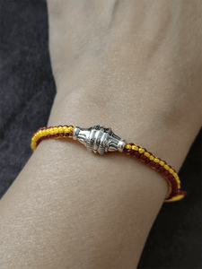 Sterling silver rakhi in adjustable yellow and maroon thread - Odara Jewellery