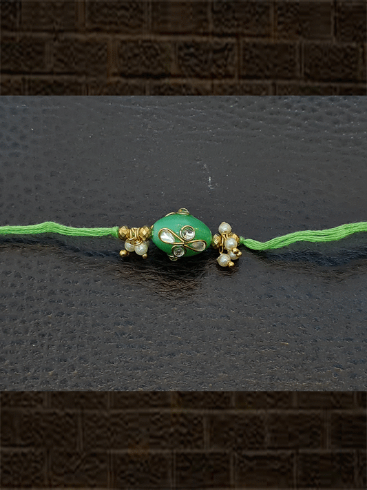 Green glass bead with kundan work pearly cluster bhabhi rakhi - Odara Jewellery