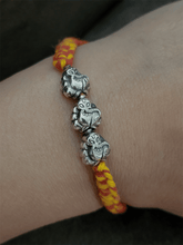 Load image into Gallery viewer, Sterling silver three ganpati ji rakhi in mouli - Odara Jewellery