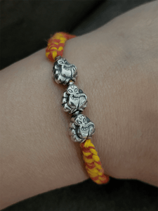Sterling silver three ganpati ji rakhi in mouli - Odara Jewellery