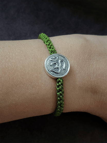 Sterling silver Om rakhi in adjustable thread - Odara Jewellery