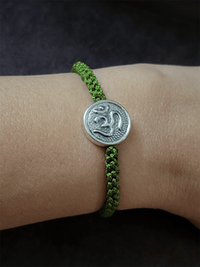 Sterling silver Om rakhi in adjustable thread - Odara Jewellery