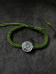 Sterling silver Om rakhi in adjustable thread - Odara Jewellery