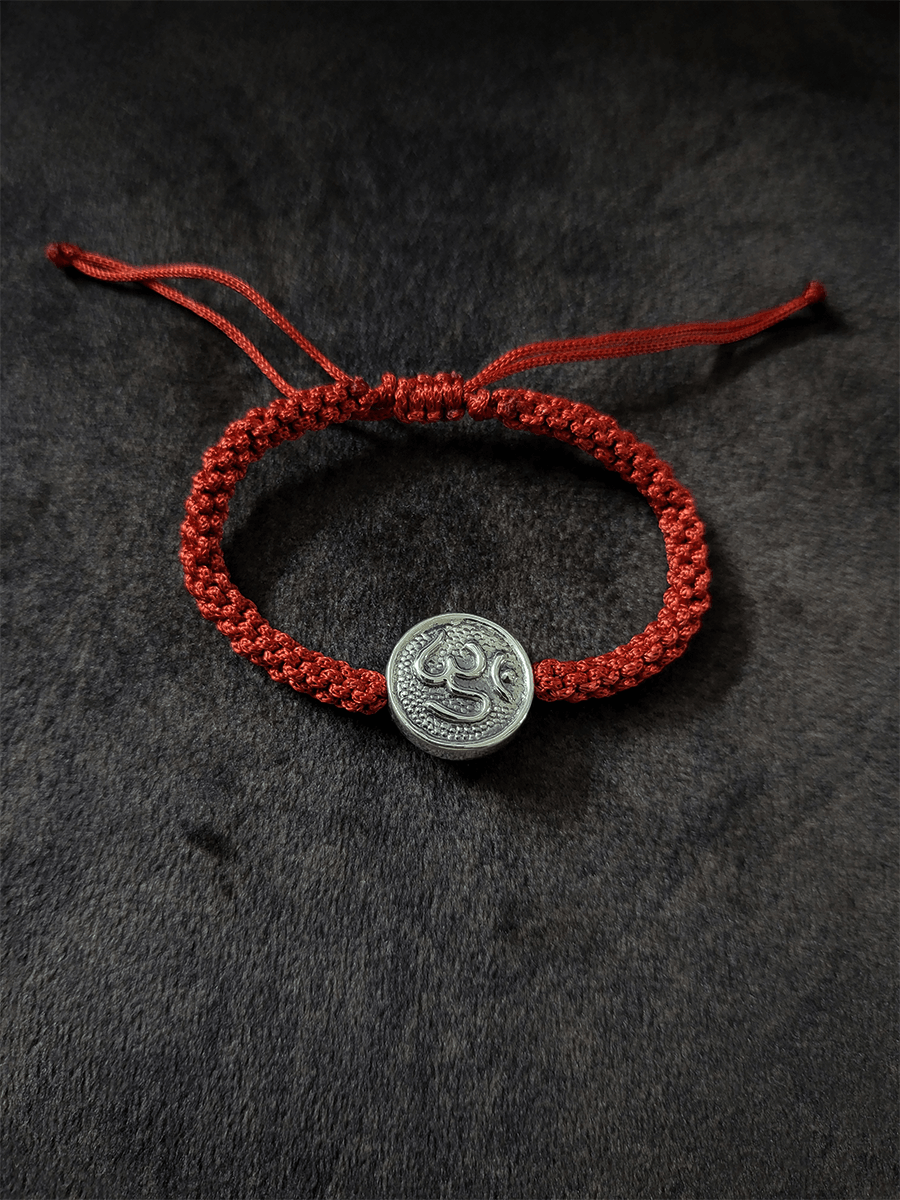 Sterling silver Om rakhi in adjustable thread - Odara Jewellery