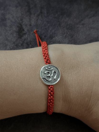 Sterling silver Om rakhi in adjustable thread - Odara Jewellery