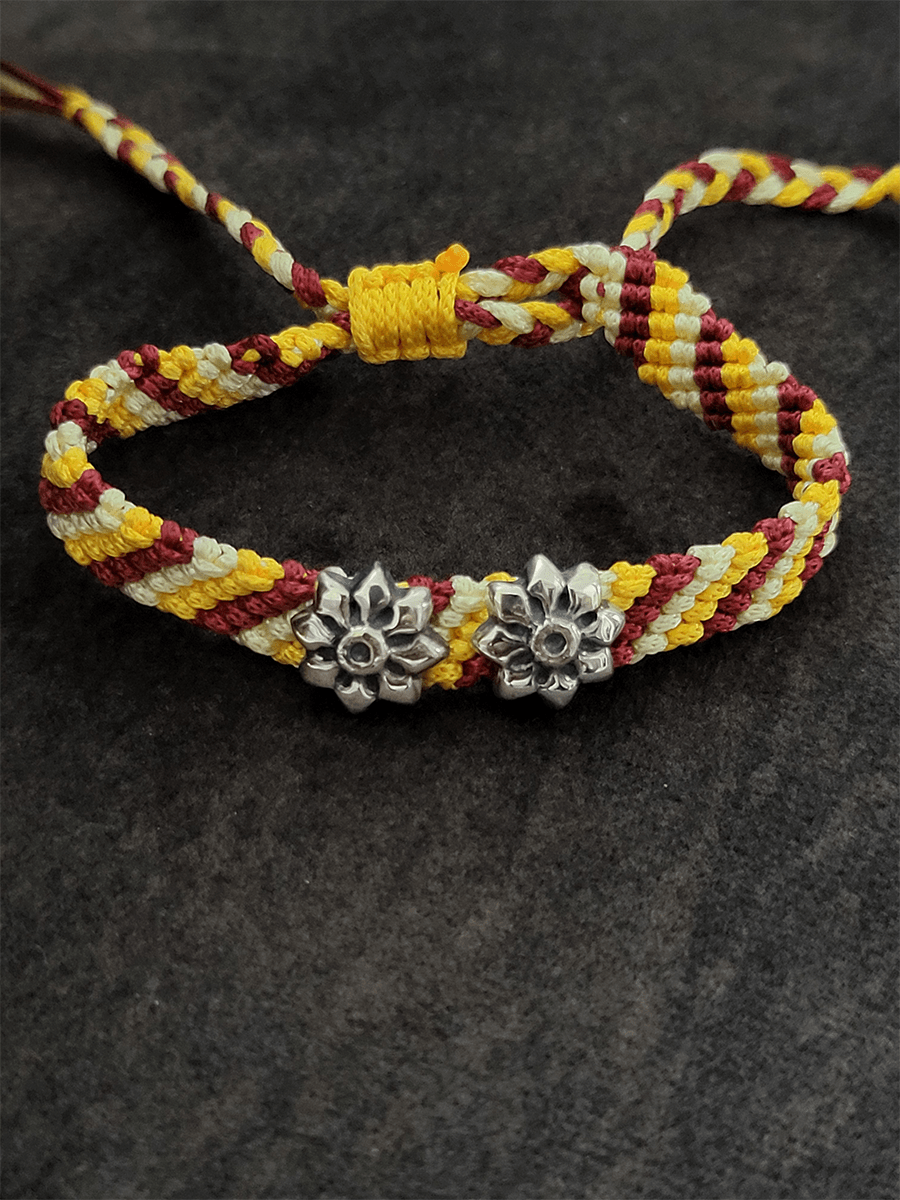 Sterling silver two oxidised flower on red,yellow and white pull-on thread rakhi - Odara Jewellery