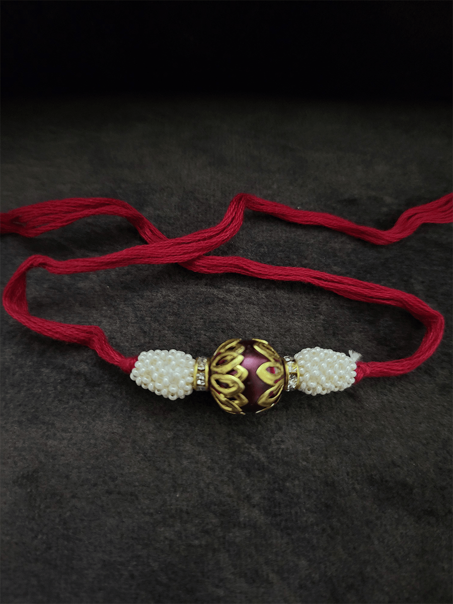 Lotus design on bead rakhi - Odara Jewellery