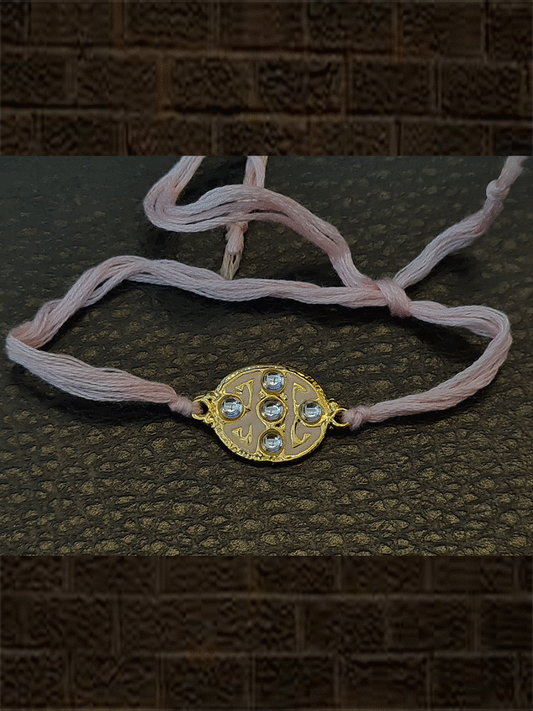 Oval pink enamel kundan stone rakhi with light pink thread - Odara Jewellery