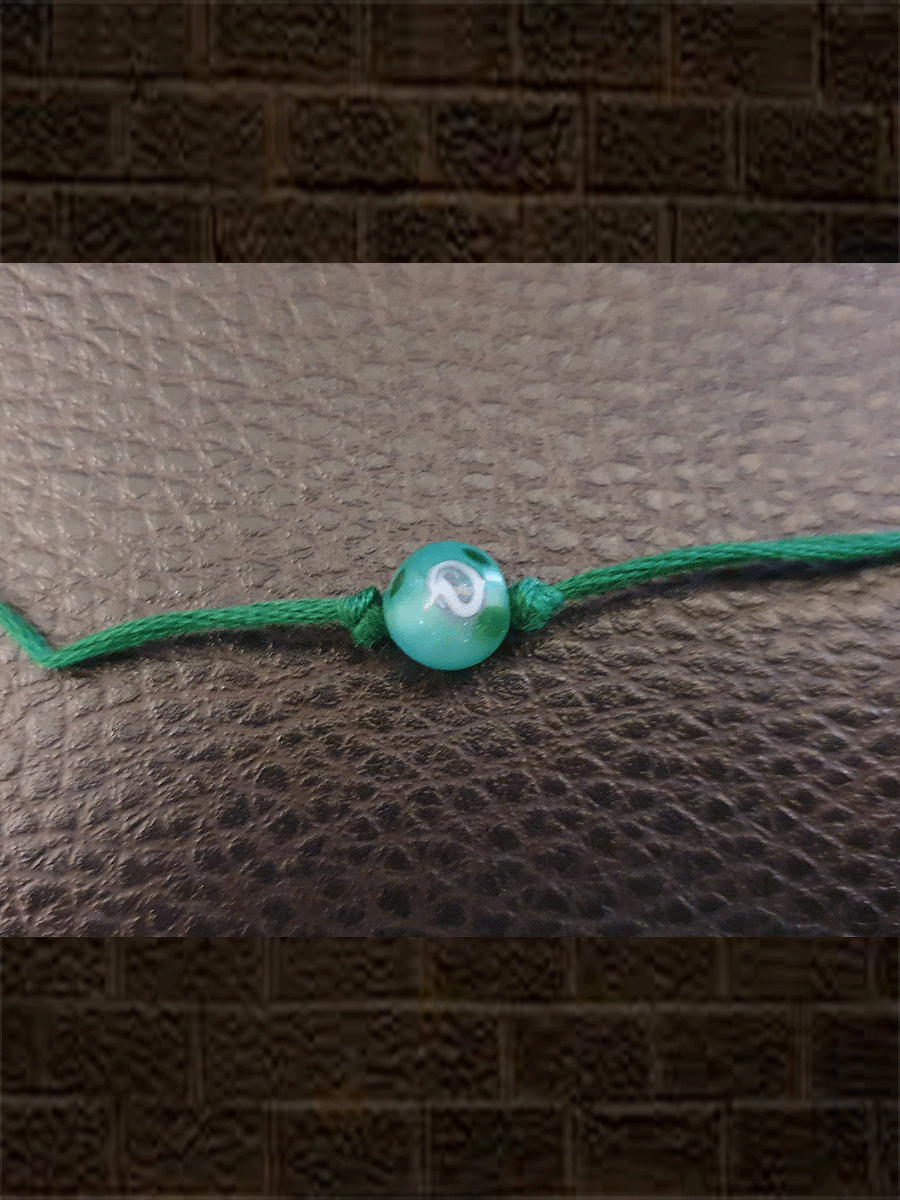 Turquoise green digital design small bead kids rakhi - Odara Jewellery