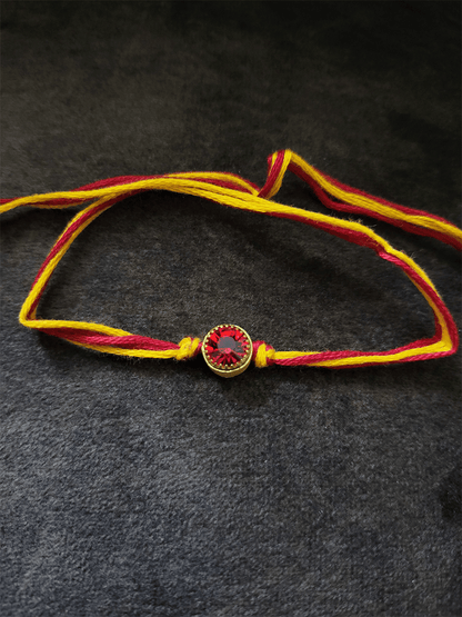 Coloured crystal stone bhai rakhi with mouli - Odara Jewellery